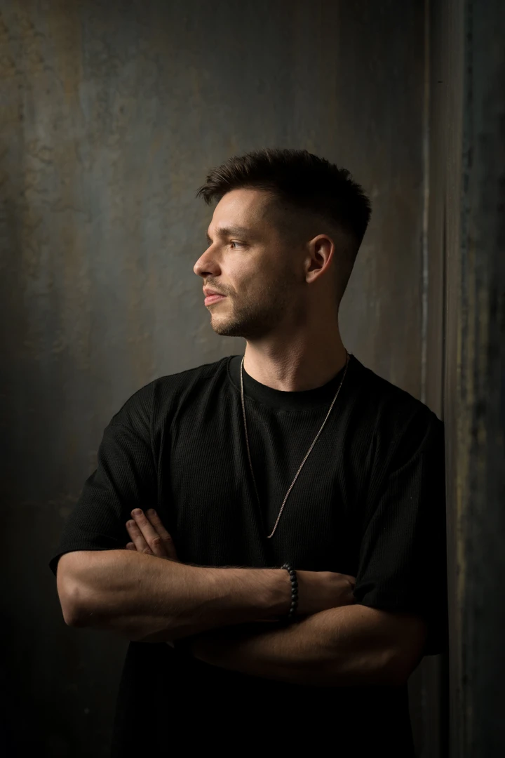 Subrage in a black T-shirt